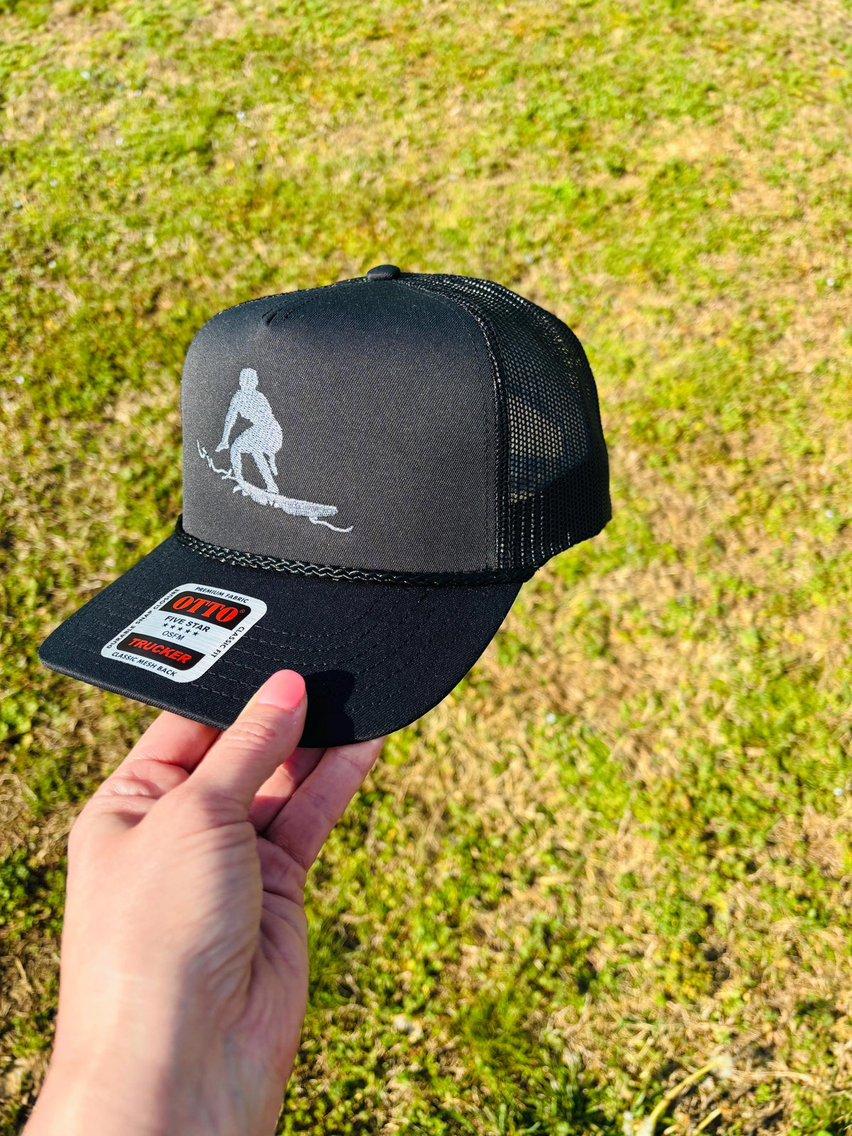 Embroidered Surfer Silhouette Trucker Hat with Rope  Charcoal Metallic Thread