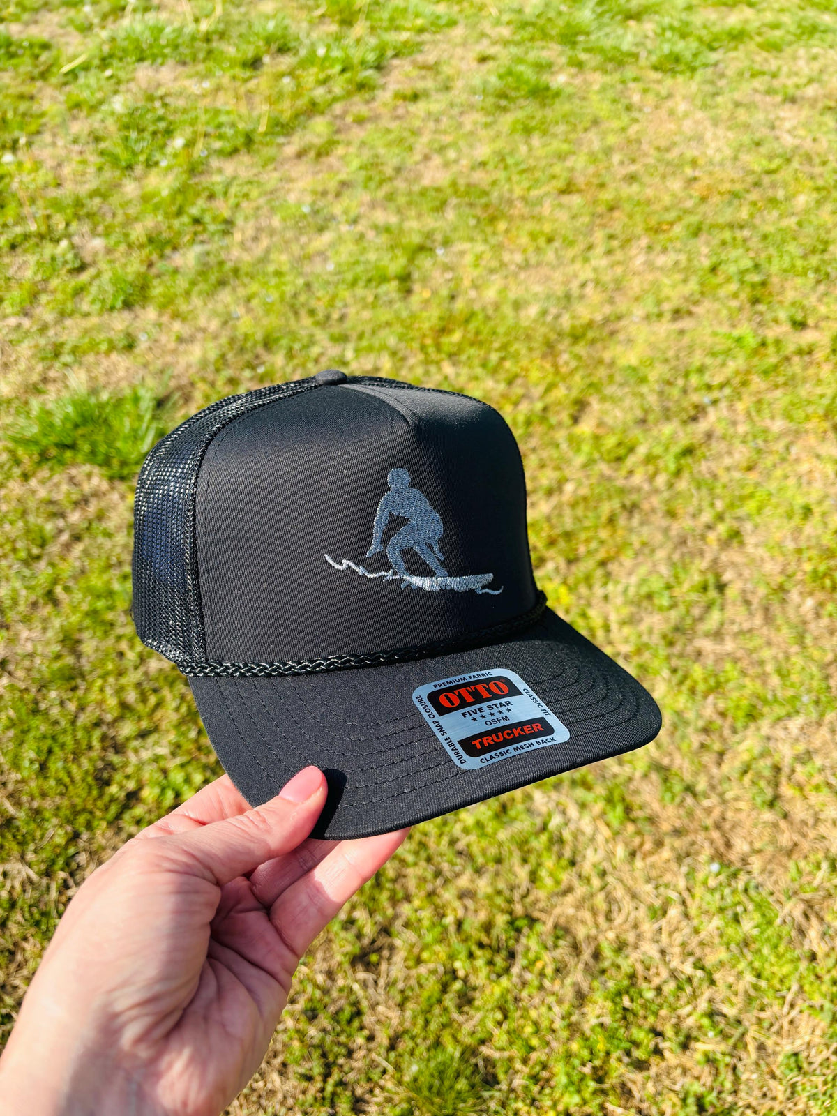 Embroidered Surfer Silhouette Trucker Hat with Rope  Charcoal Metallic Thread
